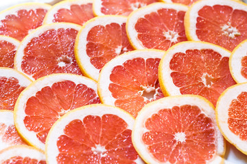Close up of sliced grapefruit as a background.