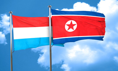 Luxembourg flag with North Korea flag, 3D rendering