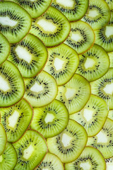 fresh kiwifruit background. round slices closeup