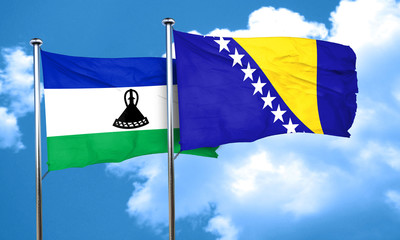 Lesotho flag with Bosnia and Herzegovina flag, 3D rendering