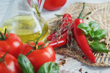 Italian food background, with tomatoes, basil, olive oil, pepper