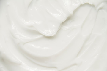 Cosmetics. Cream white background texture.