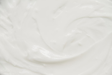 Cosmetics. Cream white background texture.