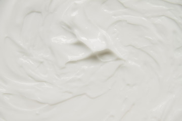 Cosmetics. Cream white background texture.