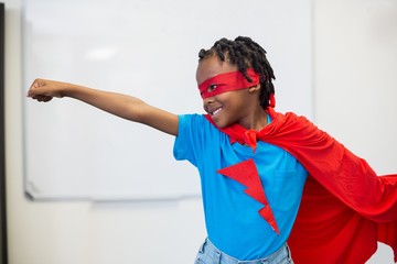 Boy pretending to be a superhero © WavebreakmediaMicro