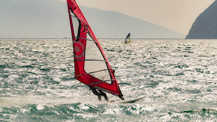 Windsurfing on Lake Garda, Italy.