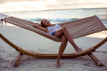 Woman relaxing on a hammock
