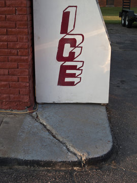 An ice maker outside of a building