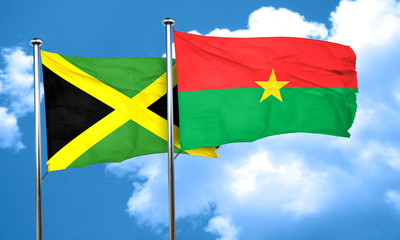 Jamaica flag with Burkina Faso flag, 3D rendering