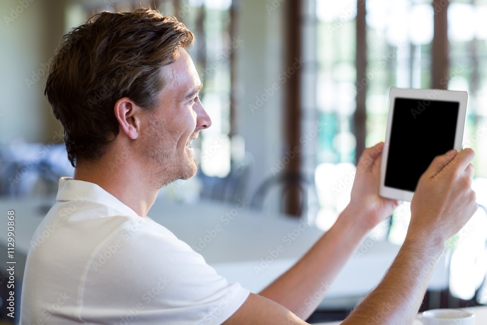 Aufkleber happy man using digital tablet