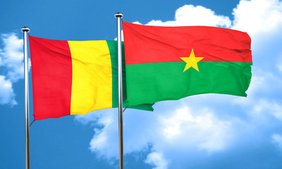 Guinea flag with Burkina Faso flag, 3D rendering