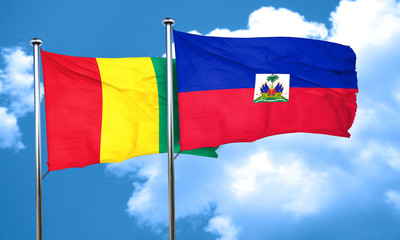 Guinea flag with Haiti flag, 3D rendering