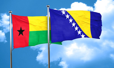 Guinea bissau flag with Bosnia and Herzegovina flag, 3D renderin