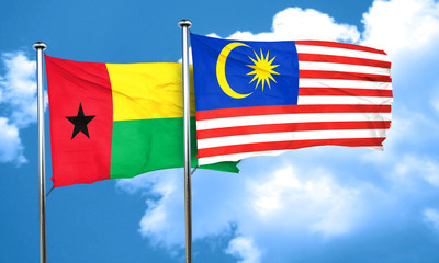 Guinea bissau flag with Malaysia flag, 3D rendering