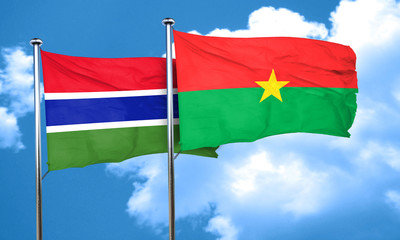 Gambia flag with Burkina Faso flag, 3D rendering