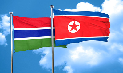 Gambia flag with North Korea flag, 3D rendering