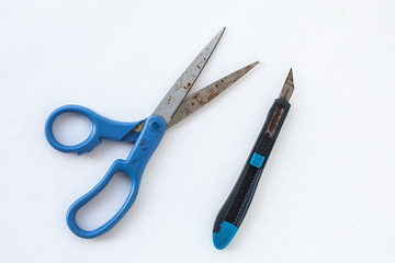 Scissors and cutter, old Scissors and knife, unsharp scissors and cutter