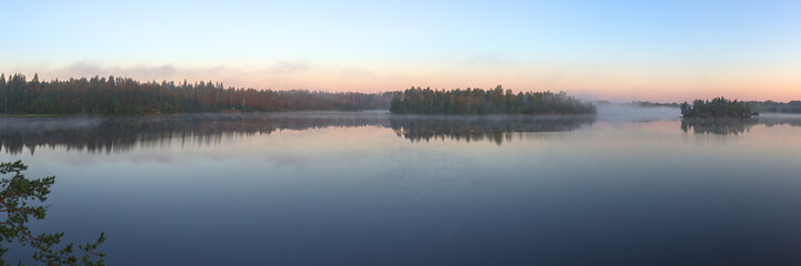 wood lake with morning fog