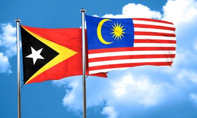 east timor flag with Malaysia flag, 3D rendering