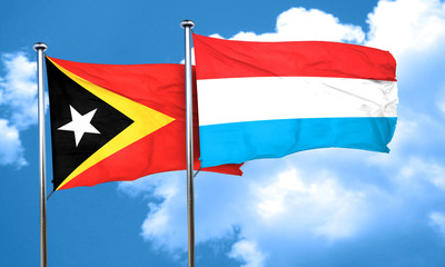 east timor flag with Luxembourg flag, 3D rendering