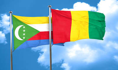 Comoros flag with Guinea flag, 3D rendering