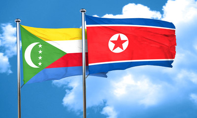 Comoros flag with North Korea flag, 3D rendering