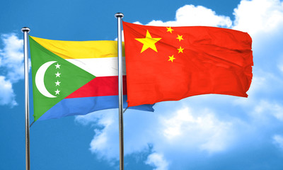 Comoros flag with China flag, 3D rendering