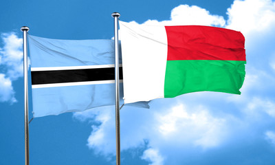 Botswana flag with Madagascar flag, 3D rendering