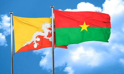 Bhutan flag with Burkina Faso flag, 3D rendering