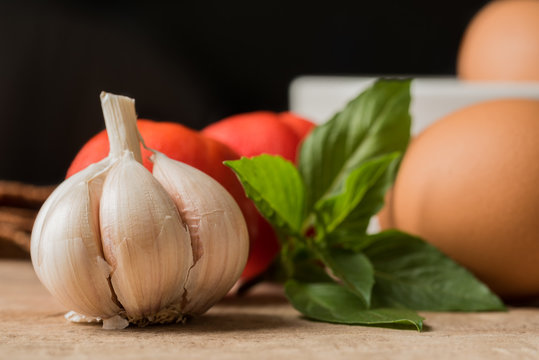 Garlic and ingredient prepare for cooking on wooden background