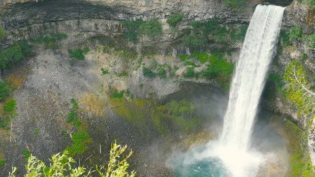 The spectacular 70 metre waterfall Brandywine Falls in Squamish, British Columbia, Canada viewpoint with marvelous canyon view and the surrounding mountains