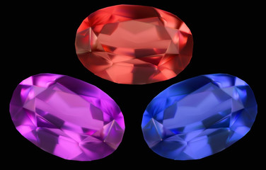 three bright gems isolated on black