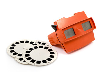 Red retro stereoscope isolated with reels on white background