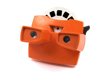 Red retro stereoscope isolated with reels on white background
