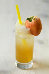 Delicious apple juice in a glass on table close-up