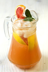 Grapefruit lemonade in jag with fruit