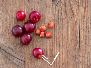 Sour cherry stone, pip removal with paperclip