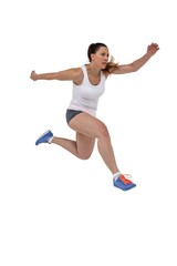 Athletic woman running on white background