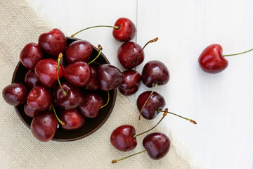 fresh cherries on wooden table