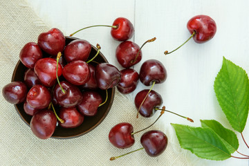 fresh cherries on wooden table