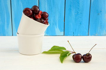fresh cherries on wooden table