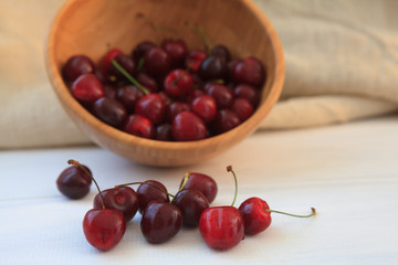 fresh cherries on wooden table