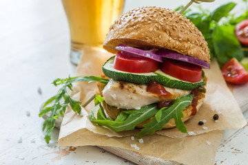 Chicken grill burger on wood background