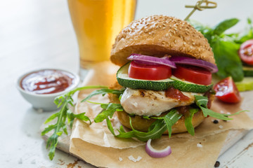 Chicken grill burger on wood background