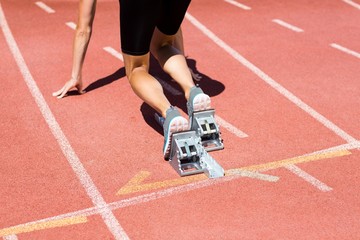Female athlete ready to run
