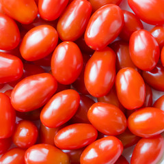 Background of red cherry tomatoes.