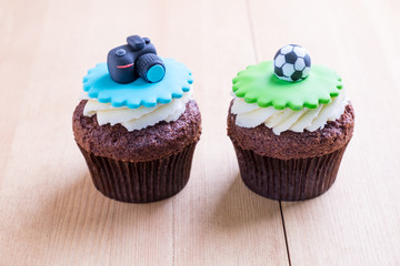 Delicious cupcakes on table