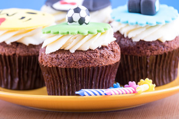Delicious cupcakes on table