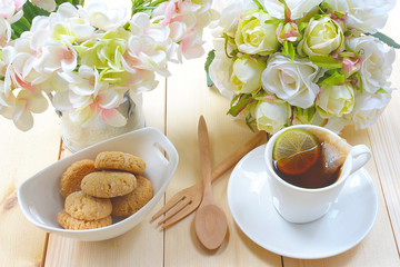 Hot lemon tea with oat cookies.