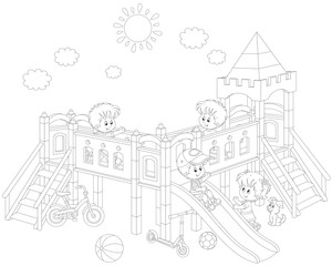 little children playing on a playground on a sunny summer day